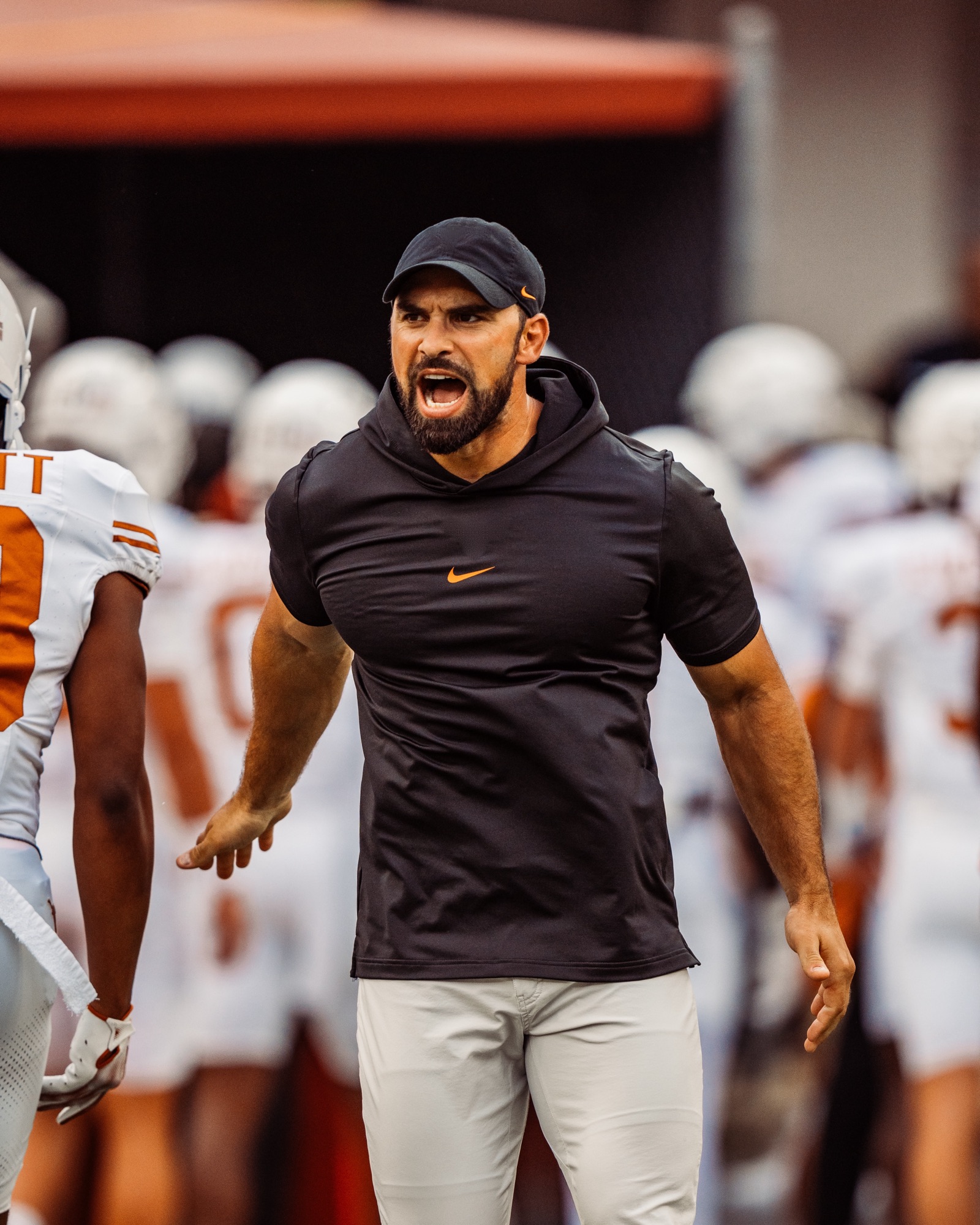 Cory Castro coaching on the sideline